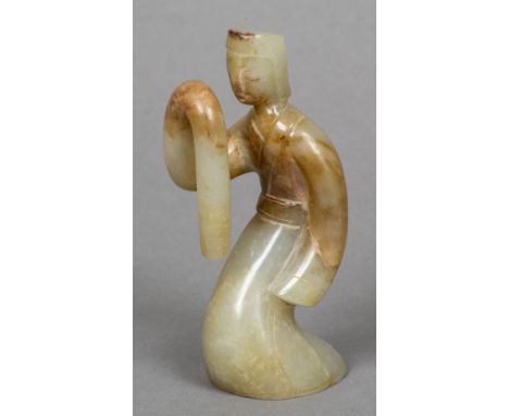 A Chinse carved celadon and russet jade dancing figure10.5 cm high.   CONDITION REPORTS:  Generally in good condition, expect