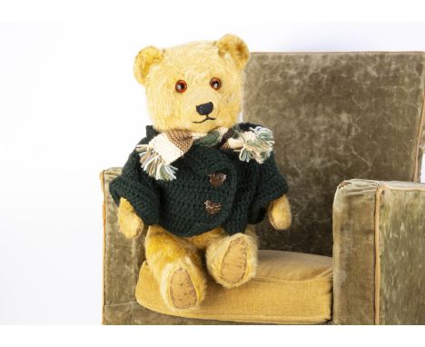 A Chiltern  1950s Ting -A -Ling teddy bear, with golden mohair, orange and black glass eyes, black stitched nose, swivel head