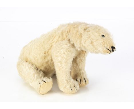 A rare Steiff polar bear with ball-jointed neck 1908-1917,  with white mohair, black boot button eyes, black stitched nose, m