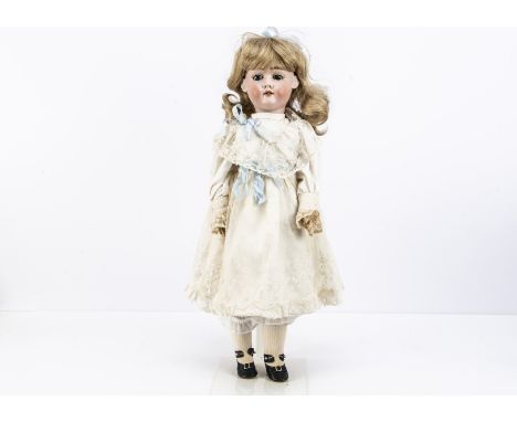 A Max Handwerck child doll, with blue sleeping eyes, recent blonde wig, jointed composition body, recent white silk dress wit