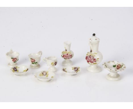 A 19th century unusually small dolls’ house milk glass coffee set, painted with pink roses comprising coffee pot -1 1/8in. (3