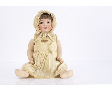 A Bahr &amp; Proschild 585 character baby, with blue sleeping eyes, dimple in chin, original light brown mohair wig, bent-lim