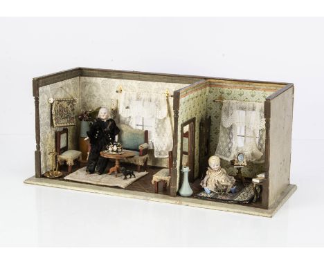An early 20th century Germany two-room room setting, with original floor paper, door way between rooms and two back windows, 