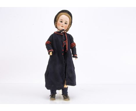 A large Schoenau &amp; Hoffmeister 914 Salvation Army child doll, with blue lashed sleeping eyes, blonde hair wig, jointed co