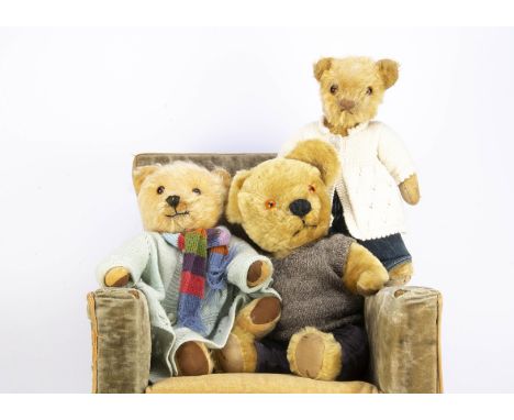 Three post-war British teddy bears, including a bear with golden mohair, brown and black glass eyes, black stitched nose, swi