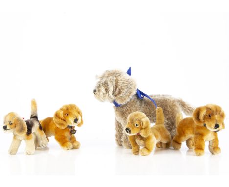 Five post-war Steiff dogs, two Bazi dachshunds, one with chest tag -6in. (15cm.) long, a Hexie dachshund, all with buttons, t