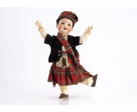 A Kämmer &amp; Reinhardt 126 character toddler,  with brown sleeping eyes, double chin, brown plush wig, jointed composition 