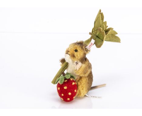 A Steiff limited edition Beatrix Potter Timmy Willie Mouse, with light brown and cream alpaca fur holding a strawberry plant 