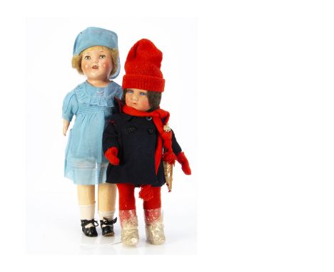 Two 1930s composition head dolls in original clothes, a girl with blue sleeping eyes, brown mohair wig, jointed straight limb