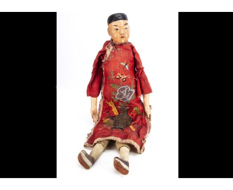 An unusual large Chinese papier-mache Chinese Opera type male doll,   with painted features, stuffed body, papier-mache hands