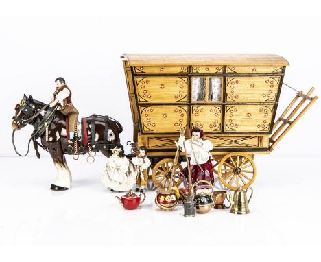 A matchstick model gypsy caravan dolls' house, fully furnished, ceramic horse  and four dolls made by Karen Grogan of Brady D