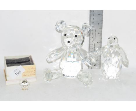 SMALL BOXED MODEL OF A BIRD, A FACET CUT GLASS MODEL OF A TEDDY AND A PENGUIN, POSSIBLY SWAROVSKI