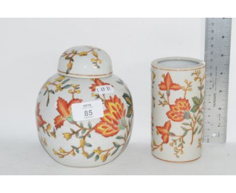 CERAMIC JAR AND COVER AND VASE DECORATED IN SIMILAR FASHION WITH FLORAL DESIGN