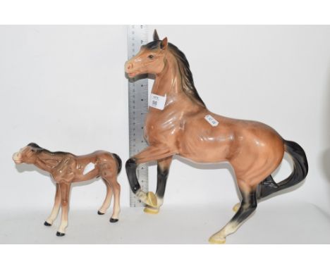 MELBA WARE MODEL OF A HORSE, TOGETHER WITH A LARGE HORSE MODEL