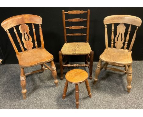 A late 18th / early 19th century elm ladder-back chair, with woven seat, turned legs and stretchers, 90cm high x 46cm wide;  