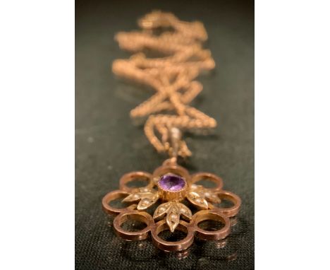 An Edwardian seed pearl and amethyst pendant necklace, central pale purple amethyst with seed pearl accented halo and ring lo
