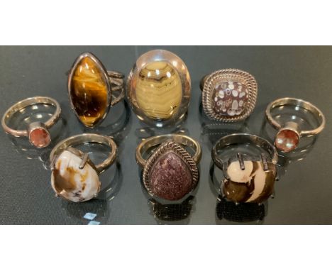 Gemporia - a Dinosaur Bone and sterling silver Aryonna ring, others Guyang Sunstone, Schelm Blend Sphalerite, Tigers Eye, Wil