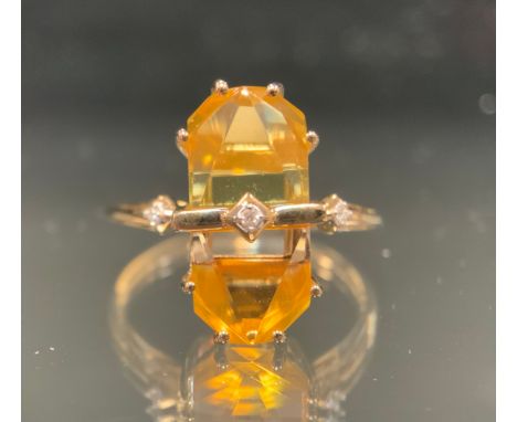 A Gemporia Glenn Lehrer limited edition cosmic obelisk lemon quartz, Mexican Fire Opal, optic quartz and diamond ring, 9ct go