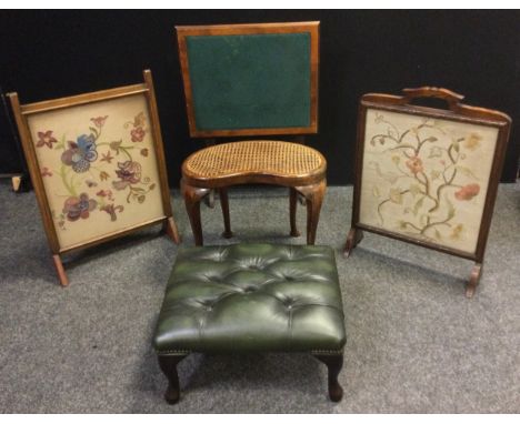 An Edwardian campaign games table, 68.5cm high x 61.5cm wide x 50.5cm;  an early 20th century oak fire screen, needlework pan