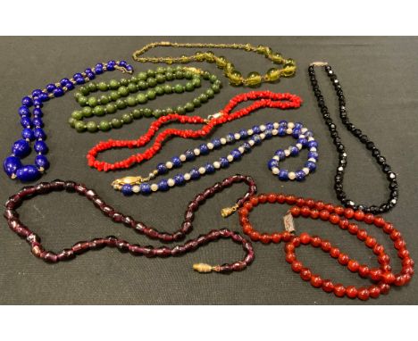 A green stone bead necklace, possibly jade,  others coral, cultured pearl and sodalite, amethyst glass etc 