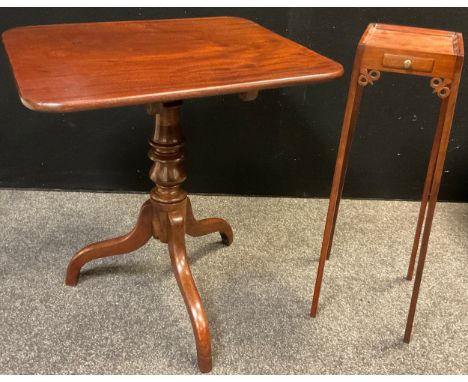 A 19th century mahogany tilt-top tripod table, rounded rectangular top, turned pedestal base, 73.5cm high x 67.5cm x 56.5cm; 