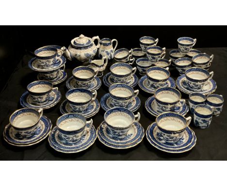 A Booths Real Old Willow pattern tea and coffee service inc teapot, tea and coffee cups, coffee cans, saucers etc. 