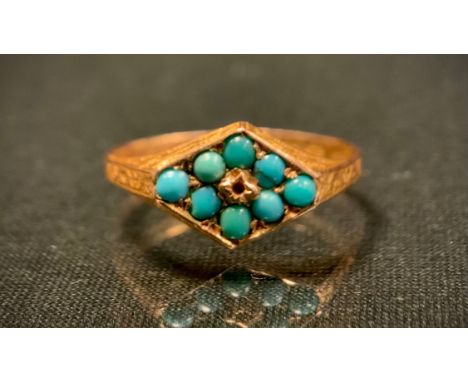 A 15ct gold signet ring, diamond lozenge crest set with eight turquoise cabochons, stamped .625, 15, size R, 2.2g gross 