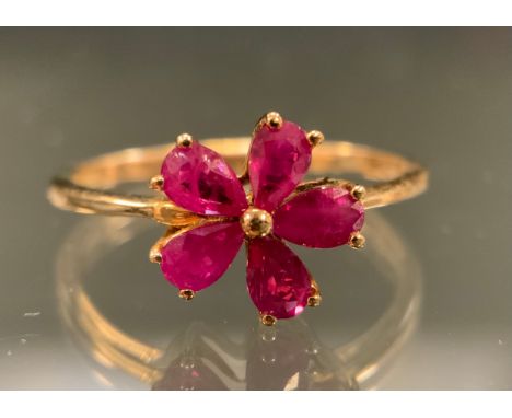 A Myanmar, (Burmese) ruby five petal floral cluster ring, five pear shape pinky red rubies, total stone weight 1.13ct,  9ct g