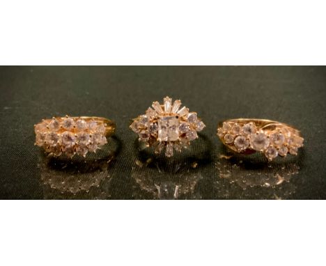 A 14ct gold DQCZ nineteen stone cluster ring, others thirteen stone, etc, all stamped 585, sizes O-P, 11.7g gross (3) 