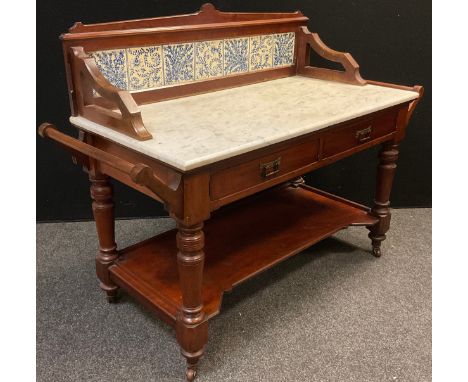 A Victorian mahogany wash-stand, three-quarter galleried back with Minton’s style blue-and-white tiles, white marble top, pai