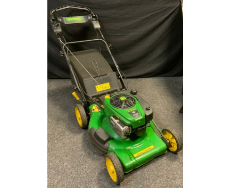 A John Deere JM46 Self Propelled Petrol Lawn mower, 875 engine series, with operator’s manual.Note - needs servicing, no batt
