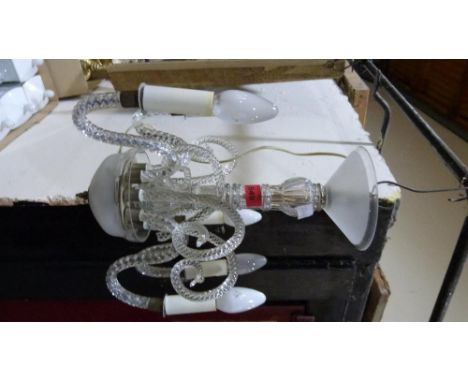 A six light glass chandelier, one scrolled cane broken