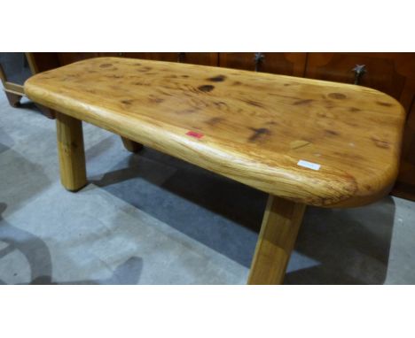 A light oak low table. 47'' long