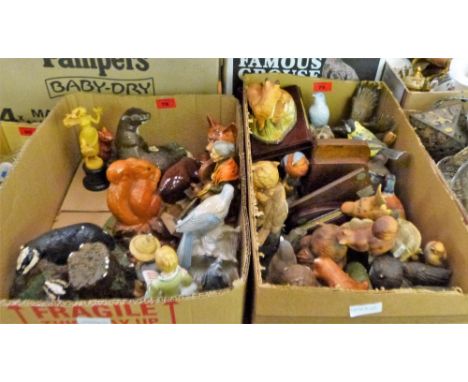 Two boxes of ceramic figures