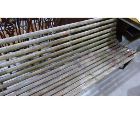 A slatted garden bench. 72'' wide