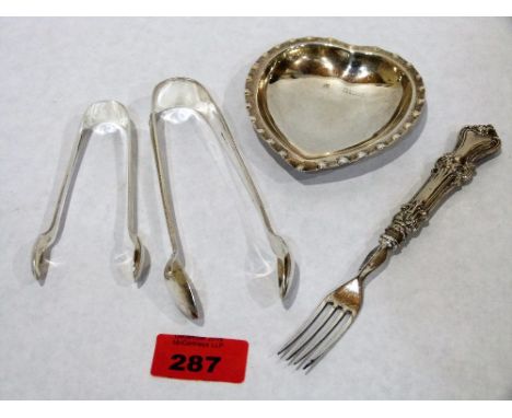 A silver trinket dish, silver sugar bow, a plated sugar bow and a pickle fork