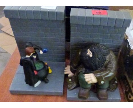 A pair of Harry Potter bookends, one inscribed and signed by Daniel Radcliffe