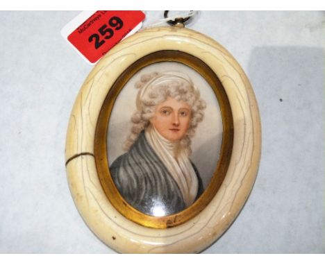 A French portrait miniat8ure of a young lady. Ivory framed. 4½'' high overall. Frame split