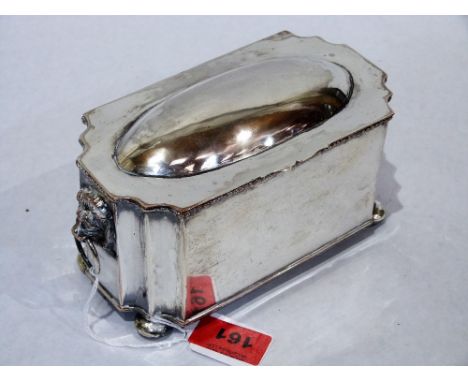 A plated caddy with lion mask handles. 7½'' wide