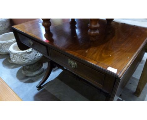 A mahogany sofa table