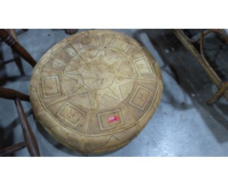 A leather pouffe