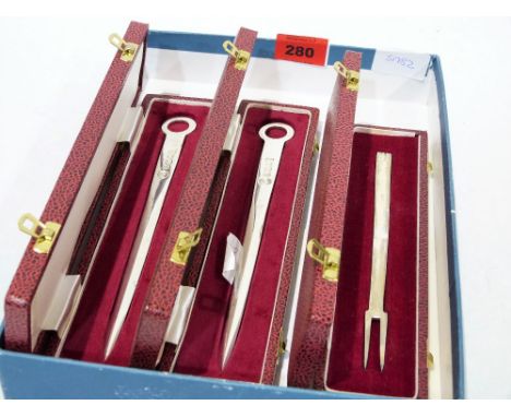 Two cased Silver Jubilee 1977 silver letter knives and a cased pickle fork, 5ozs 4dwts
