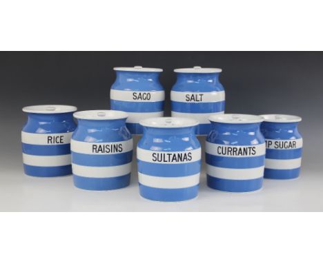 Seven Cornish ware jars and covers by T G Green &amp; Co Ltd, early 20th century, of typical blue and white striped design, o