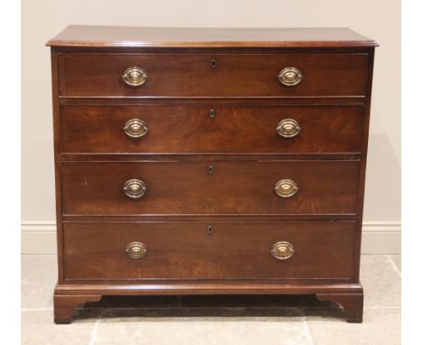 A 19th century mahogany straight front chest of drawers, formed from four long graduated and cock beaded drawers, applied wit