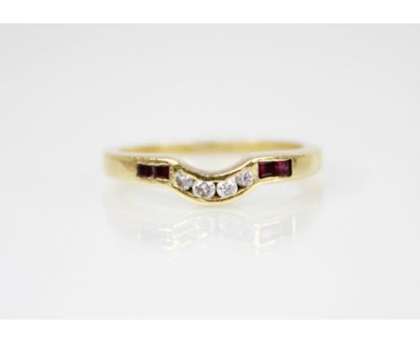 An 18ct gold ruby and diamond ring, the arched head channel set with four brilliant cut diamonds, with step cut rubies to sho