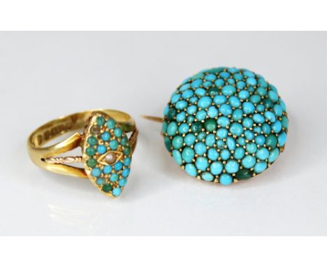 A late Victorian turquoise and pearl set 15ct gold ring, the navette shaped head set with a central seed pearl and turquoise 