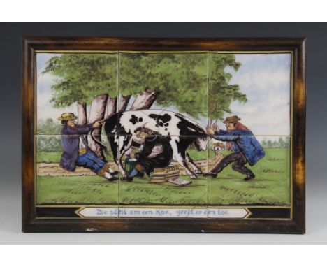 A Dutch delft six tile panel, depicting a comical scene of a cow being milked, with the motto ‘Who pleads for a cow, admits o