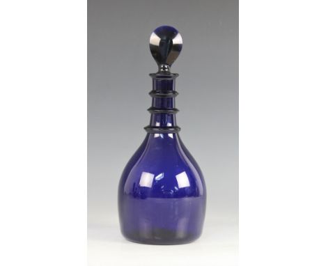 A Georgian Bristol blue glass decanter, the mallet shaped body with triple ring neck, with bevelled lozenge shaped stopper, 2