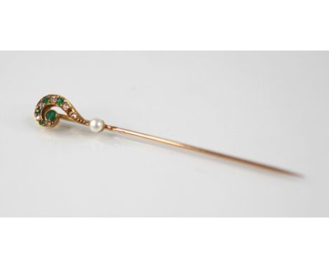 A novelty diamond, emerald and pearl stick pin, modelled as a question mark, set with mixed cut diamonds and emeralds, termin