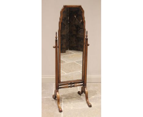 A Queen Anne style walnut cheval mirror, early 20th century, the shaped rectangular mirror within a moulded frame, raised upo